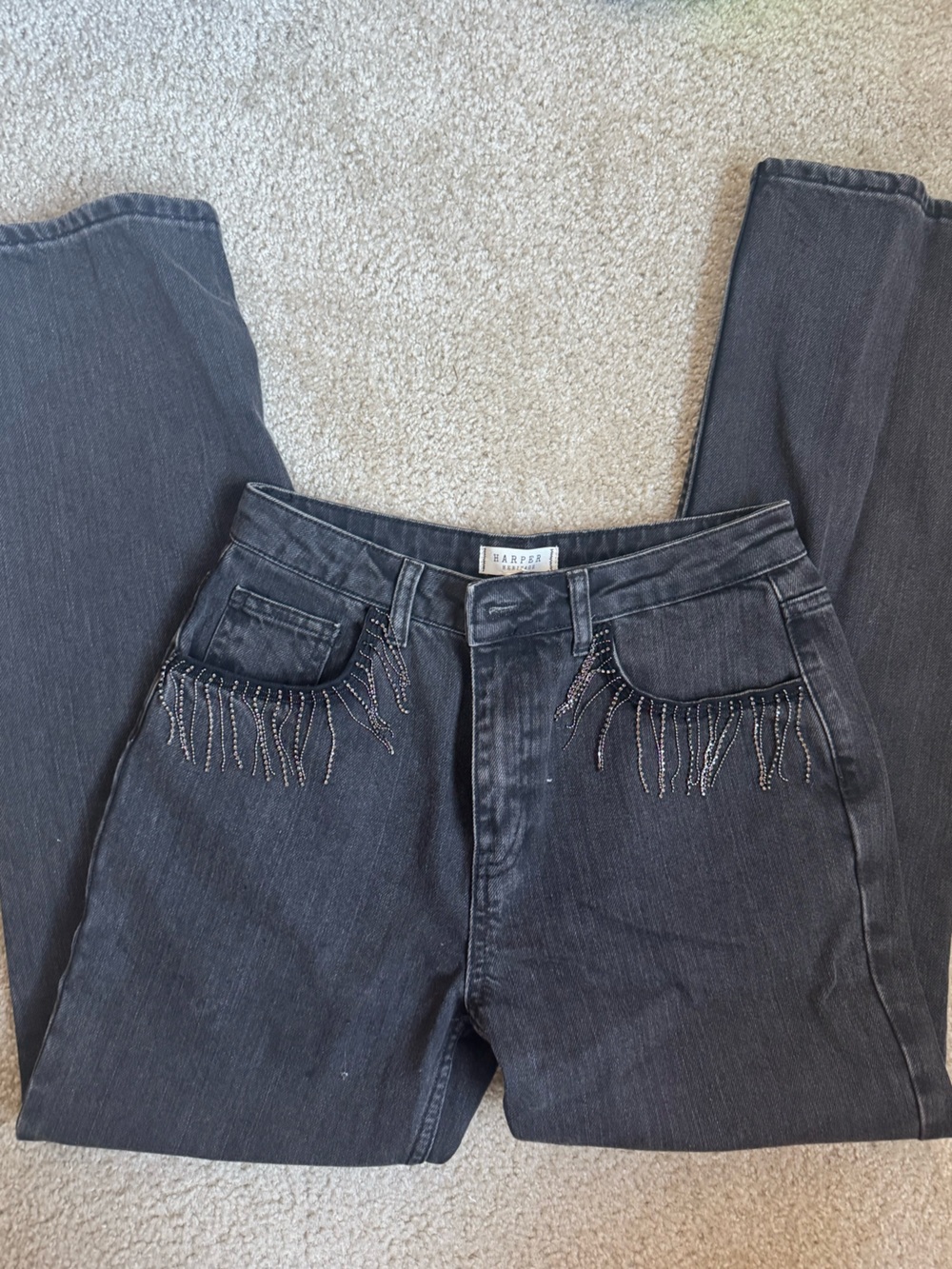 Black straight leg jeans with beaded fringe